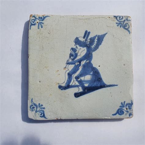 Antique Tile With Cupid Playing Bagpipes Rare Earthenware Catawiki