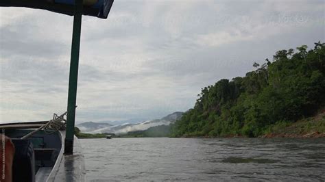 Boat Tour In Amazonian River By Stocksy Contributor Kike Arnaiz