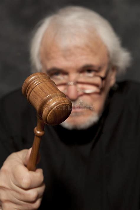 Old Male Judge In A Courtroom Striking The Gavel Stock Photo Image Of