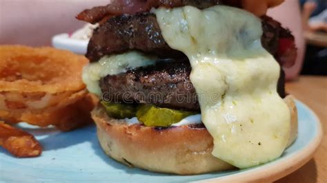 Big Appetizing Burger With Double Meat Cutlet Onion Rings Pickles