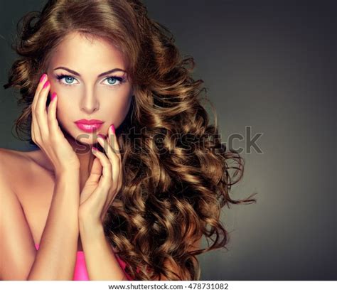 Beautiful Model Brunette Long Curled Hair Stock Photo