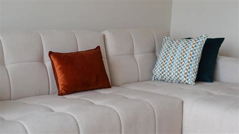 modern sofa with pillows in living room at home 39106234 Stock Video at Vecteezy