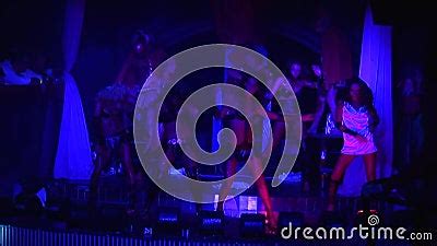 Go Go Dancer In Bikini On Pole On Stage Of Nightclub Slow Motion