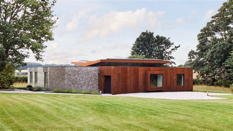 Hudson Architects Wraps Coast House In Flint And Corten Walls