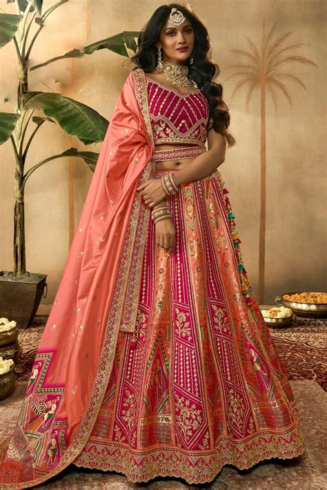 Buy Coral Maroon Banarasi Silk Embroidered Lehenga Set With Belt