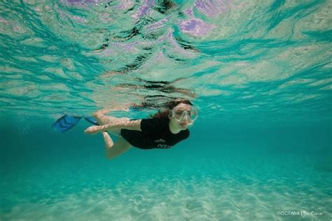 Retro Bikini Miranda Cosgrove Flaunts A Blue Bikini As She Dives With Dolphins In The Bahamas