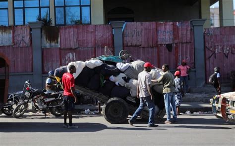 Haiti Orders Curfew After Armed Gangs Overran Two Prisons Releasing