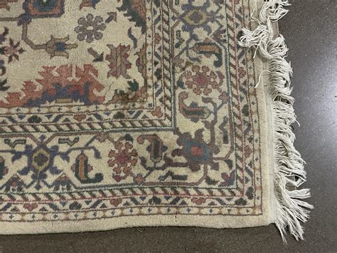 Lot 105in Traditional Persian Style Fringed Area Rug