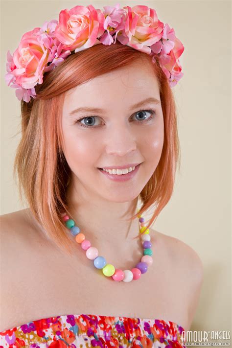 Smiling Redhead Babe Getting Naked