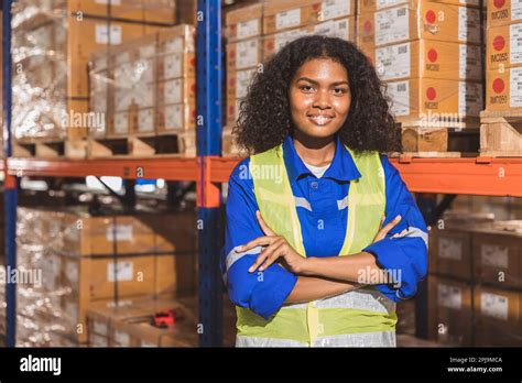 Portrait Black African Woman Warehouse Worker Confident Smiling Labor