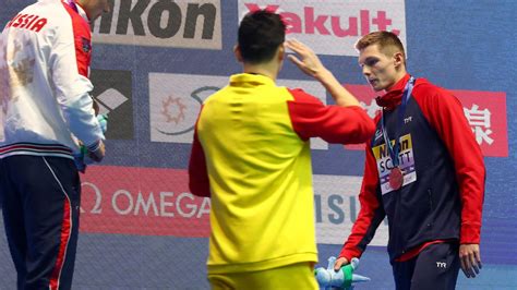 Swimming news - Sun Yang wins 200m freestyle title... but Duncan Scott REFUSES to shake his hand ...