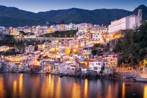 Premium Photo | Scilla italy on the port at dusk