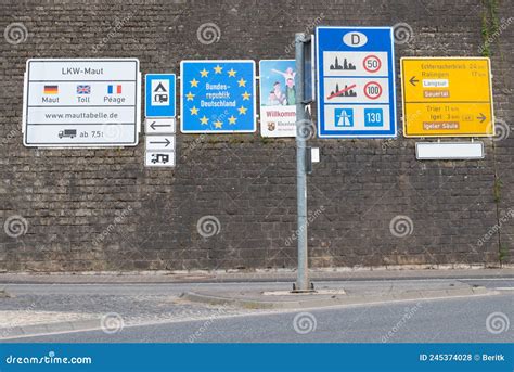 Signs For The Border Control At An International Airport Terminal