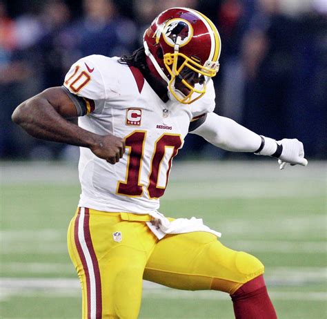 Redskins' RG3 feasts on Cowboys' defense