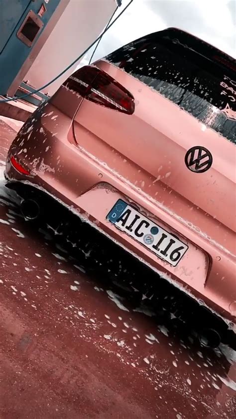 Pink Car Parked In Snow