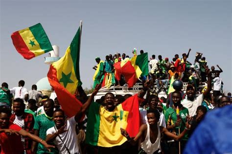 Foot Les images de l accueil triomphal des joueurs sénégalais après