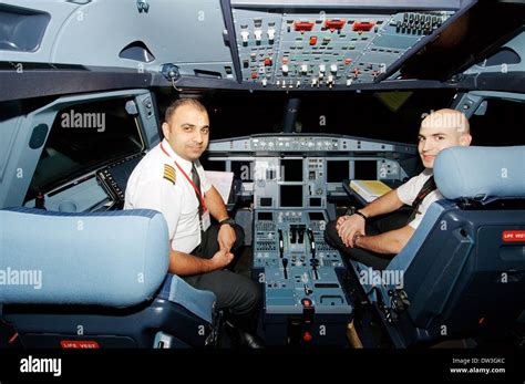 Pilots aircraft Airbus A-320 in the cockpit, airport Sharjah, Sharjah ...