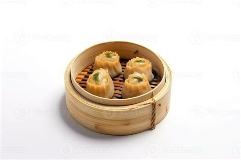 Steamed Dim Sums In A Bamboo Basket Isolated On White Background