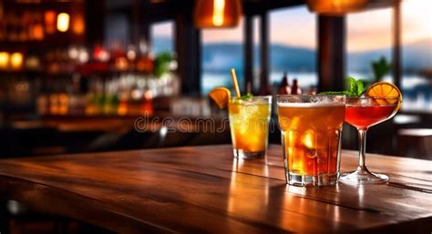 Wooden Table With A View Of Blurred Beverages Bar Backdrop Stock Photo