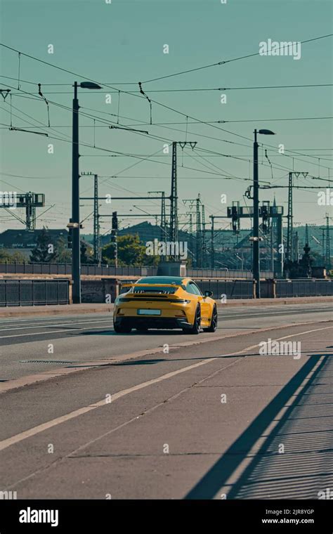 porsche 911 carrera yellow Stock Photo - Alamy