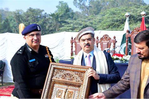 Governor Khyber Pakhtunkwa And Ig Kp Present A Souvenir To Caretaker