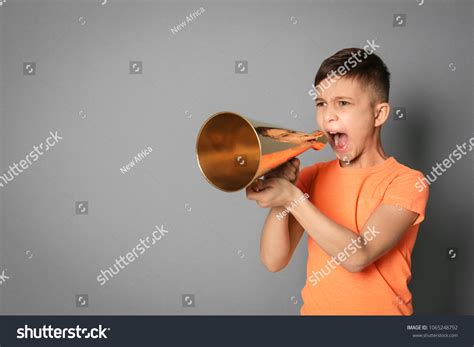 Cute Little Boy Megaphone On Grey Stock Photo 1065248792 Shutterstock