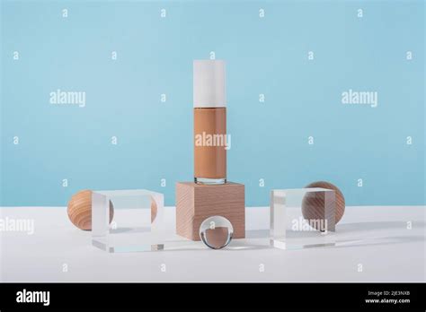 Cosmetic Liquid Foundation Nude Cream Bottle Mockup On Acrylic And Wooden Block Podium Pedestal