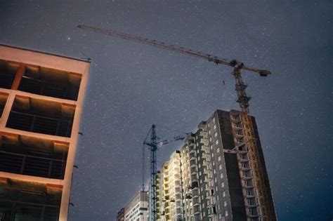 Premium Photo | Construction crane at night