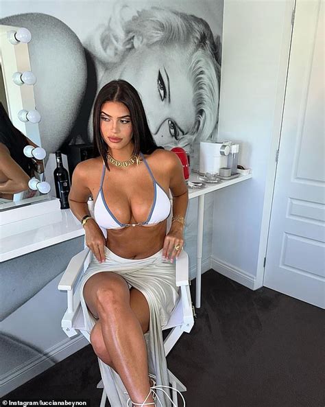 model lucciana beynon flaunts  ample assets   skimpy bikini