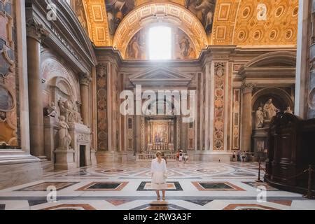 Vatican City - August 28, 2023: A young blonde female tourist explores ...