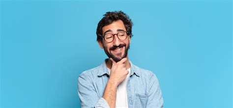 Premium Photo Young Crazy Bearded Man Thinking Or Doubting Expression