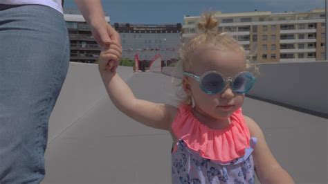 Fashionable little girl in sunglasses 28680077 Stock Video at Vecteezy