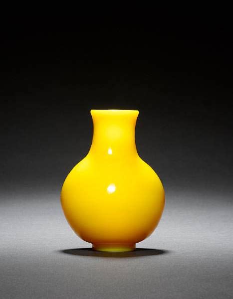 An Octagonal Facetted Green Glass Bottle Vase Qianlong Mark And Of The Period And An Imperial