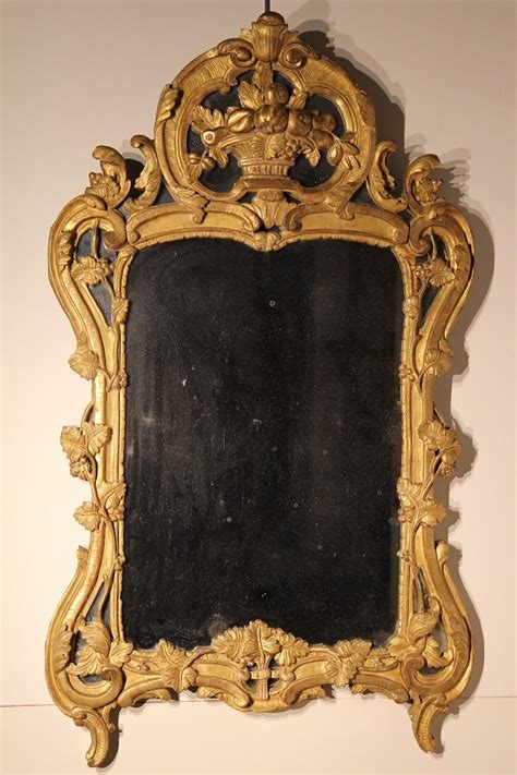 Miroir à parcloses dit de Beaucaire en bois doré Epoque XVIII Vendu