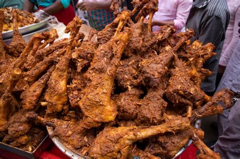 Premium Photo Roasted Leg Pieces Of Mutton At A Street Food Market In