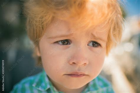 Frustration Child Emotions A Sad Child Looks Into The Distance