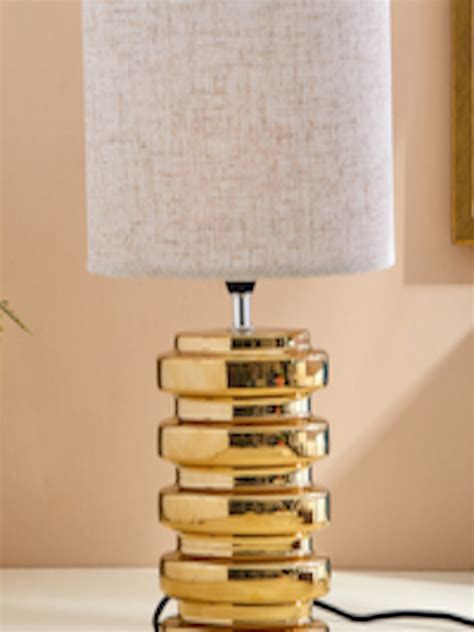 Buy Home Centre Tranquil Golden And Beige Ceramic Textured Table Lamp Table Lamps For Unisex