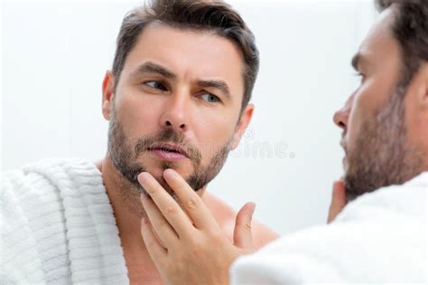 Sensual Man With Perfect Skin Touch Face After Shaving Skin Care Healthcare Cosmetic Procedures