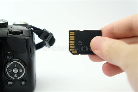 Inserting Sd Card Into A Dslr Camera Stock Photo Image Of Cameras