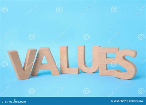 Word Values Made Of Wooden Letters On Light Blue Background Stock Image