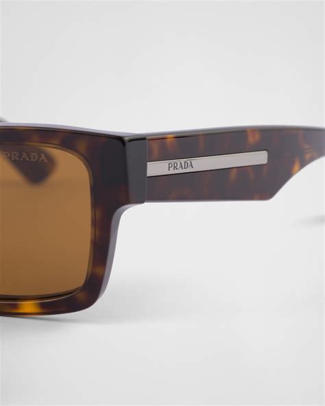 Crystal Burnt Orange Lenses Sunglasses With Iconic Metal Plaque Prada