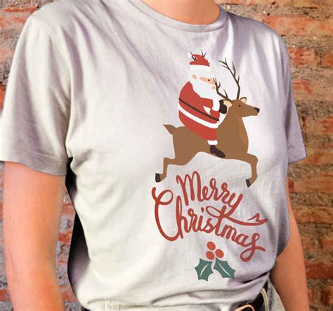 Camiseta de navidad Santa claus con diseño de renos TenVinilo