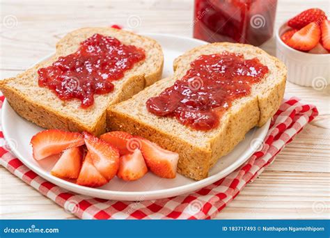 Whole Wheat Bread With Strawberry Jam And Fresh Strawberry Stock Image