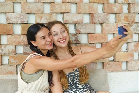 Premium Photo Ukrainian Woman Brunette And Russian Woman Blonde