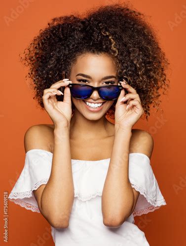 Beautiful Black Woman Smiling And Wear Sunglasses Stock Photo And