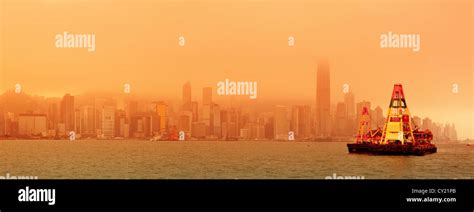 Hong Kong Victoria Harbour sunrise with red color Stock Photo - Alamy