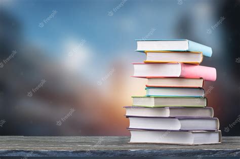 Premium Photo Stack Of Colorful School Books On Wooden Desk