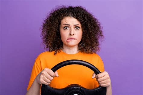 Photo Of Doubtful Unsure Lady Dressed Orange T Shirt Biting Lip Scaring