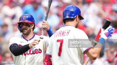 Bryce Harper And Trea Turner Of The Philadelphia Phillies Warm Up In