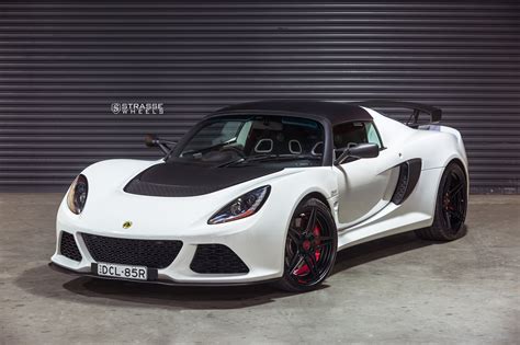 Modified White Lotus Exige Wearing Aftermarket Body Kit and Strasse Wheels — CARiD.com Gallery